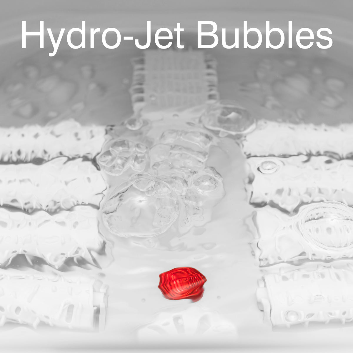 A close-up shot of the hydro-jet bubbles in the Foldaway Foot Spa Bath with the text "Hydro-Jet Bubbles." The bubbling action is a key feature in this foot soaker, offering a relaxing and rejuvenating foot massage spa for at-home foot care.