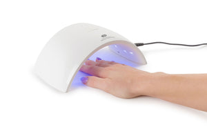 hand under Salon Pro UV & LED Lamp curing gel nails
