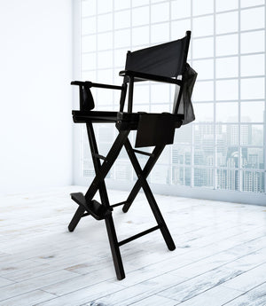 angled view of professional make up artists chair in studio setting