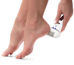 lady using Go smooth 60 second pedi hard skin remover on heels of feet