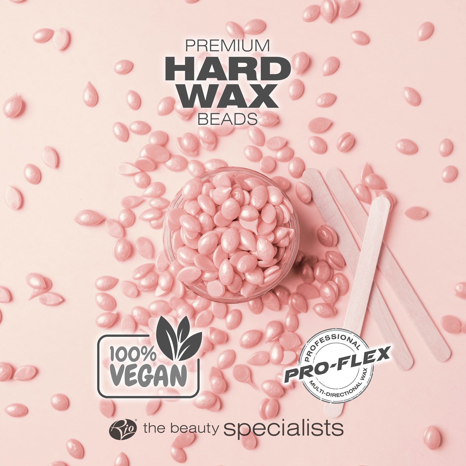 Rose premium hard wax beads laid out with spatulas labelled 100% vegan and professional pro-flex wax