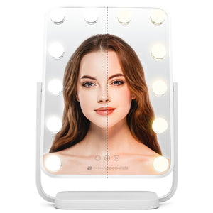 hollywood glamour dressing table mirror with reflection of ladies face and 12 LED lights half illuminated with natural light and half illuminated with warm light 