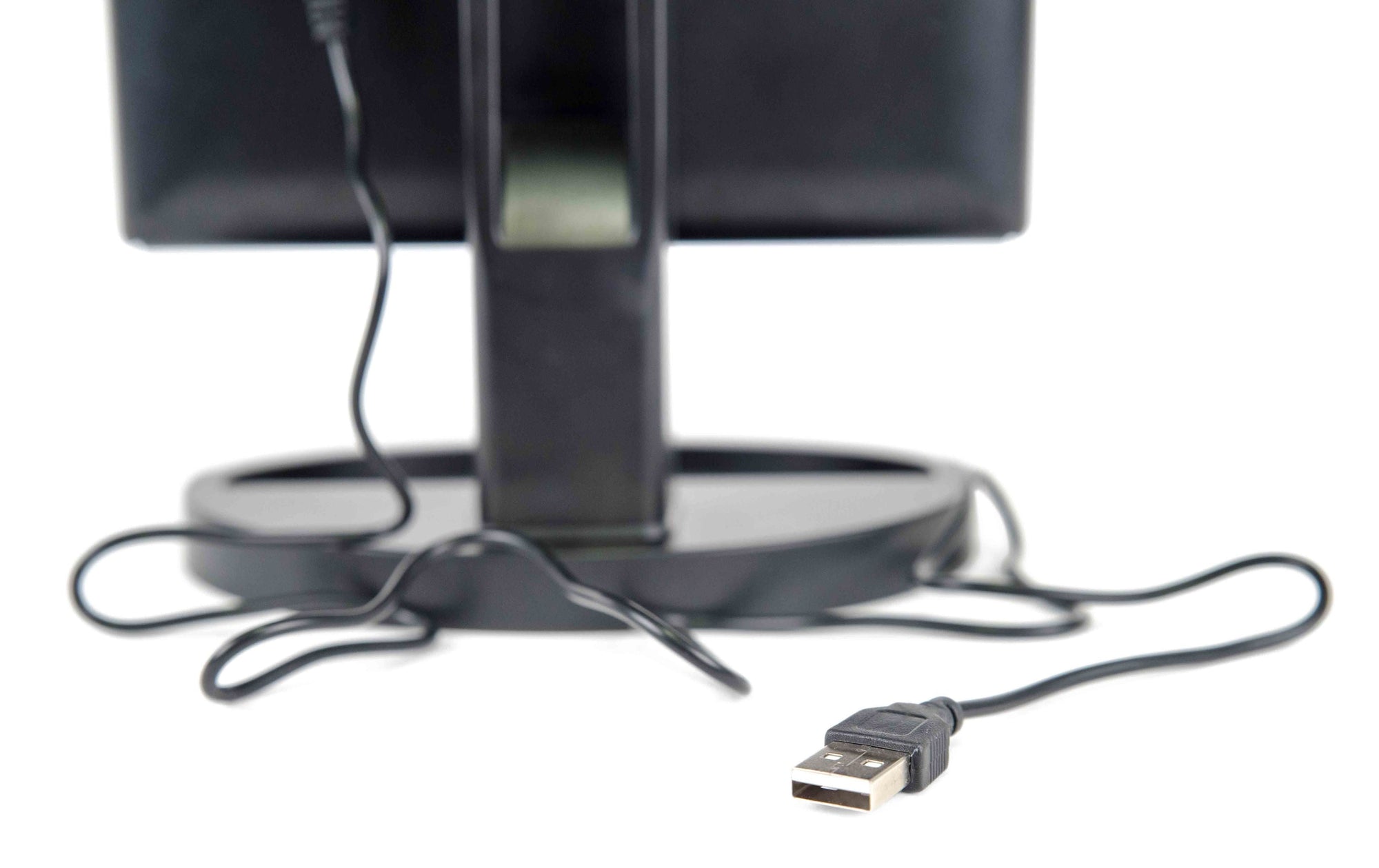 close up of USB charging cable plugged into rear or mirror
